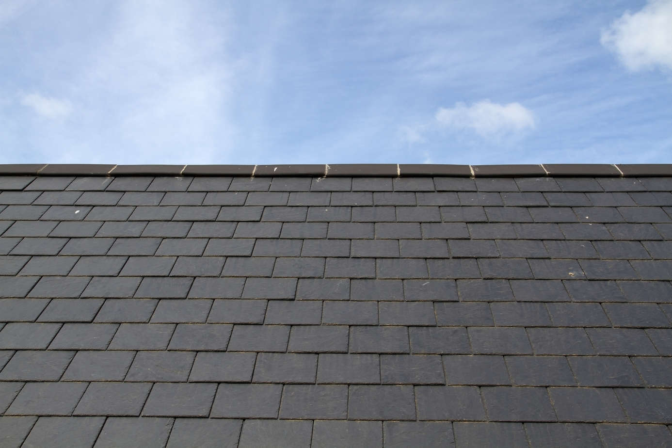 Slate roof against blue sky on the island of Jersey