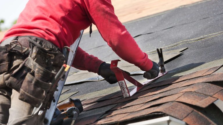 roofing contractor Re-roofing vs. Roof Restoration: The Definitive Guide